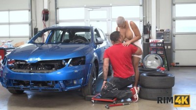 Mechanic's Busty Wife Gets Down and Dirty in the Garage